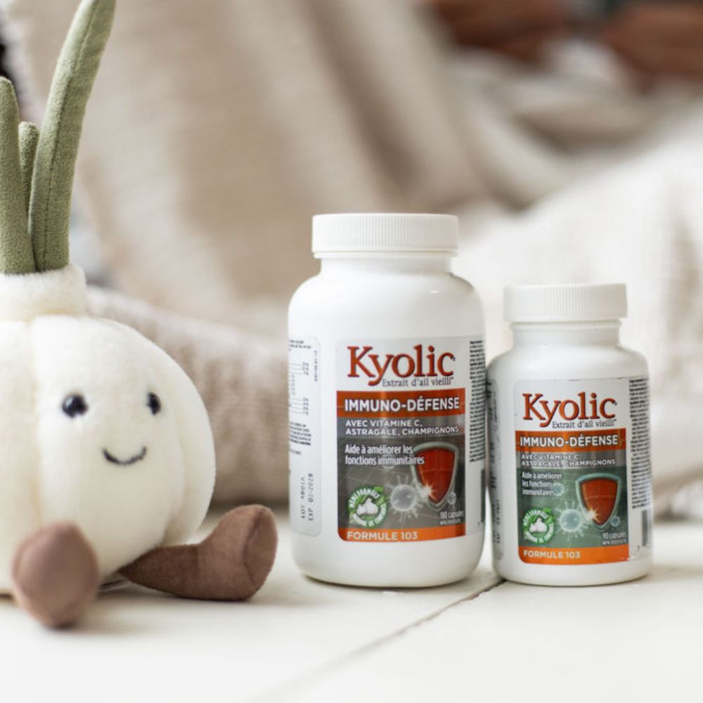 Kyolic Lifestyle Image of Kyolic ImmuneDefence Product Next to a Garlic Toy